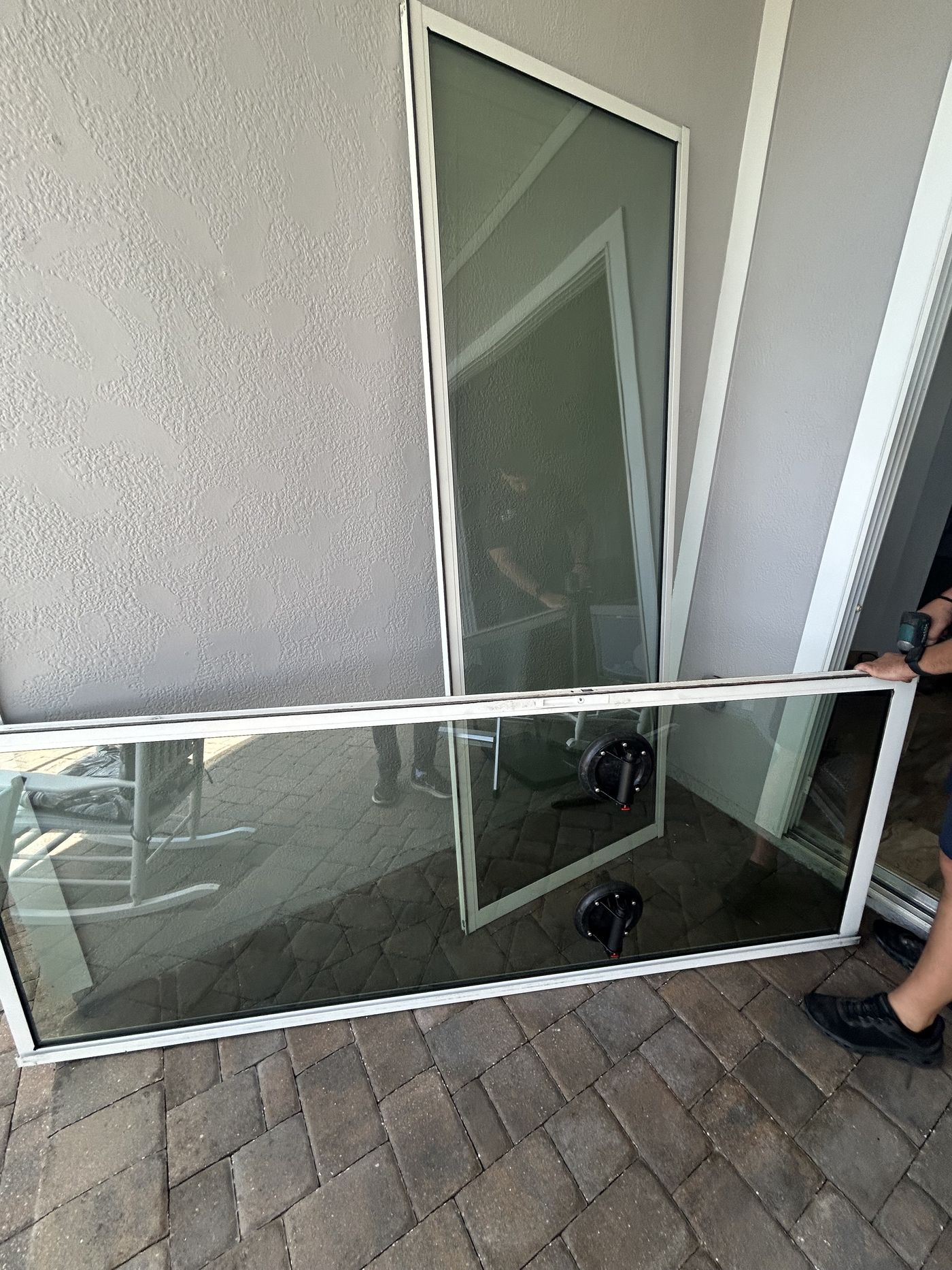 Sliding glass door repair in progress